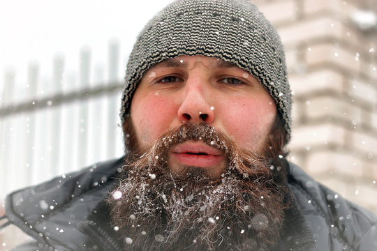 bearded man ice snow winter