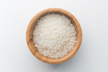 Fototapeta na wymiar Top view of Japanese rice in wooden bowl white background isolate