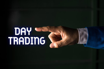 Handwriting text writing Day Trading. Conceptual photo securities specifically buying and selling financial instruments Isolated hand pointing with finger. Business concept pointing finger