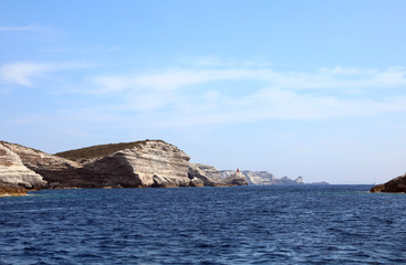 Fototapeta na wymiar wide cliffs and blue mediterranean sea in Corsica Island