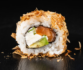 sushi on the black background