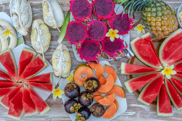 Obraz na płótnie Canvas Tropical fruits assortment on a table, close up, top view. Island Bali, Indonesia