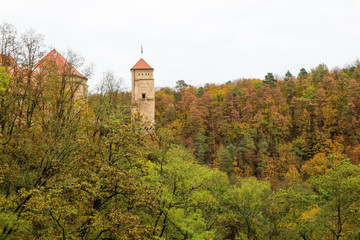 Towers of medieval Veveri castle near Brno, Czech republic in beautiful colorful autumn forest