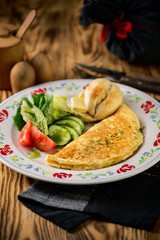 traditional breakfast dish, omelet with vegetables