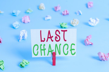 Conceptual hand writing showing Last Chance. Concept meaning final opportunity to achieve or acquire something or action Colored clothespin rectangle shaped paper blue background