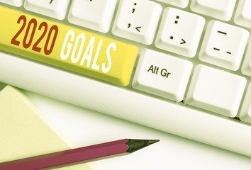 Handwriting text writing 2020 Goals. Conceptual photo A plan to do for something new and better for...
