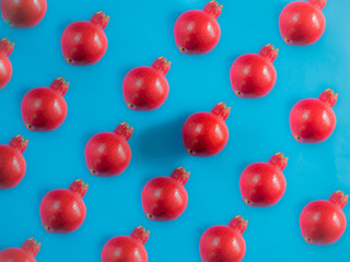 Pomegranate pattern on blue background