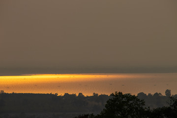 Golden sky at sunset on the river