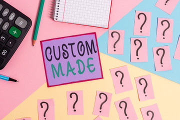 Handwriting text Custom Made. Conceptual photo something is done to order for particular customer organization Mathematics stuff and writing equipment above pastel colours background