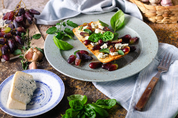 Fresh tomato bruschetta with blue cheese