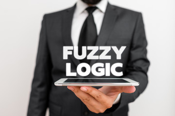 Writing note showing Fuzzy Logic. Business concept for checks for extent of dirt and grease amount of soap and water