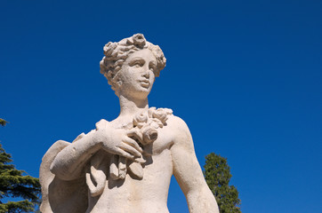 Fototapeta na wymiar classical statue against blue sky
