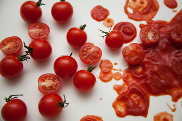 cherry tomato sauce on a white table