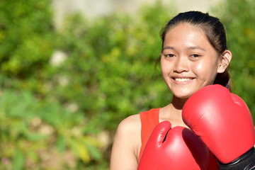 Female Boxer And Happiness Wearing Boxing Gloves