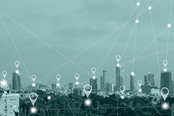Location gps  or Map pin flat above green tone city scape and network connection concept. Green tone city scape and network connection concept.