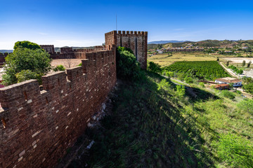 Fototapeta na wymiar Beautiful landscape from the battlements of Silves Castle in Algarve region, one of the best-preserved Moorish Castles in Portugal