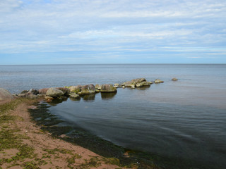 picture overlooking the rocky sea shore