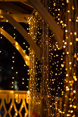 Fototapeta na wymiar Christmas lights. Home decoration for christmas. Christmas garland, street lights for the new year. Christmas photo background with light bulbs and copy space.