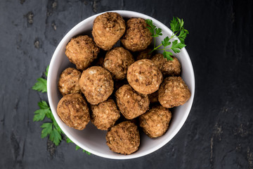 Meatballs (fresh made) as detailed close-up shot, selective focus)