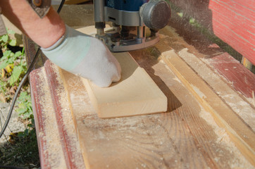 old master carpenter doing work