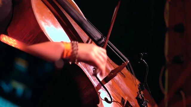 Girl playing chello at the concert