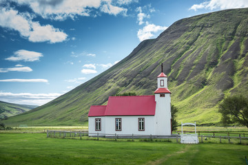 Beautiful small red roof church in Iceland