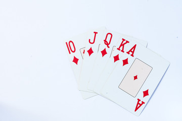 Karty do gry na białym tle, karty do gry karo ułożone w wahlarz