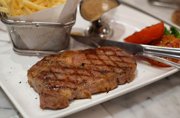 australia beef steak with tomato and frenchfried