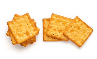 Crushed dry cracker cookies isolated on white background.