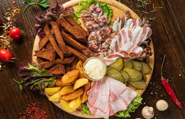 meat appetizers on the wooden background
