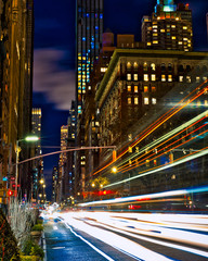 Fototapeta na wymiar Light trails through the city that never sleeps, New York.