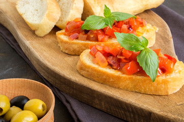 traditional Italian bruschetta with tomatoes, pepper and Basil