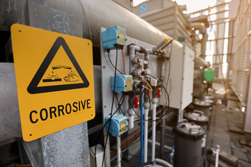 Dangerous corrosive warning signs and symbol applying where chemical substance storage used on...
