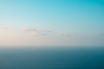 blue sky and ocean horizon on sunny summer day