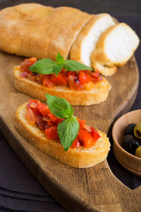 traditional Italian bruschetta with tomatoes, pepper and Basil