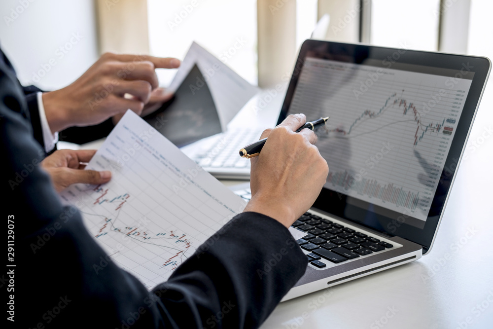 Poster Business team investment working with computer and analysis graph stock market trading with stock chart data, business and technology concept