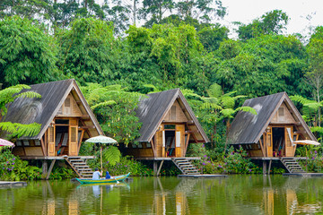 Fototapeta na wymiar Small houses with terrace by the lake in Lembang, Indonesia