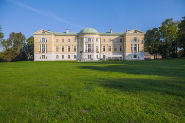 City Mezotne, Latvia Republic. Park with old castle. Trees and green zone. Sep 9. 2019 Travel photo.