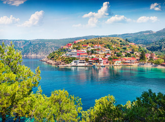 Impressive morning cityscape of Asos village on the west coast of the island of Cephalonia, Greece, Europe. Colorful spring sescape of Ionian Sea. Traveling concept background.