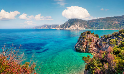 Fototapeta premium Stunning spring view of Agia eleni beach. Colorful morning seascape of Mediterranean Sea. Bright outdoor scene of Kefalonia island, Greece, Europe. Traveling on Ionian Islands.