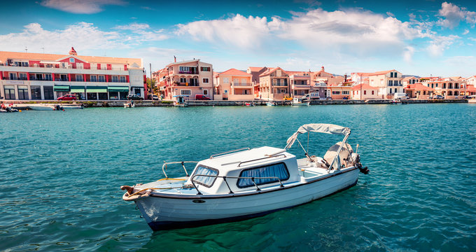 Panoramic morning view of Lixouri port. Colorful spring seascape of Ionian Sea. Picturesque outdoor scene of Cephalonia island. Traveling concept background. Instagram filter toned.
