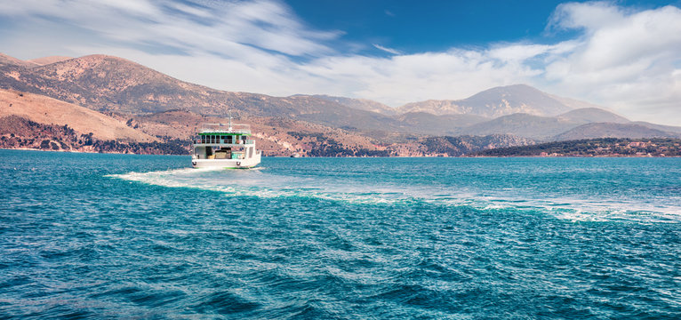 Panoramic view of Ionian island - Cephalonia. Ferry ship from Lixouri to capital of island - Argostolion. Beautiful spring seascape of Mediterranean sea. Traveling concept background.