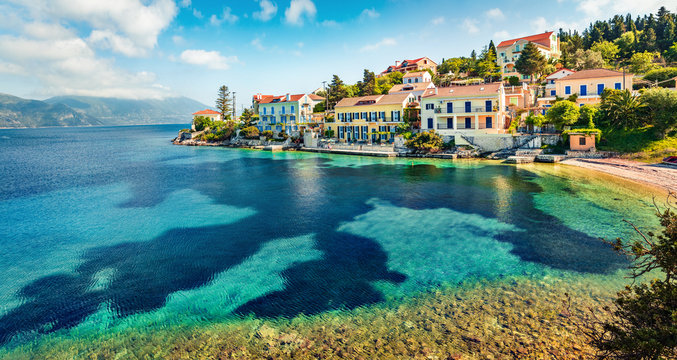 Fabulous spring view of Zavalata Beach, Fiskardo village. Gorgeous morning seascape of Ionian Sea. Marvelous outdoor scene of Kefalonia island, Greece, Europe. Traveling concept background.