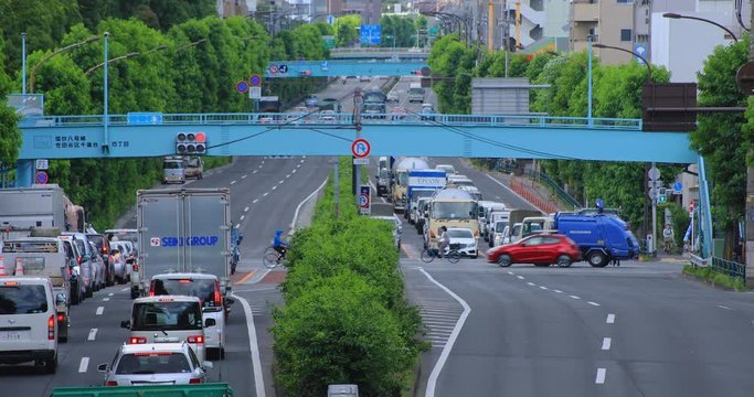 A downtown street at Kanpachi avenue in Tokyo daytime