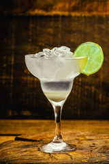 Frozen lime and mint margarita in glasses