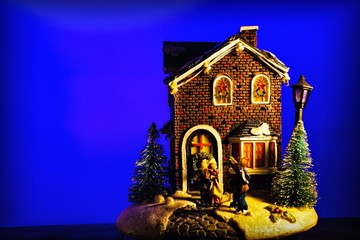 christmas house on blue background