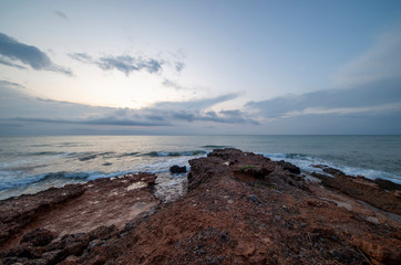 Fototapeta na wymiar Cloudy sunrise on the coast of Oropesa del Mar