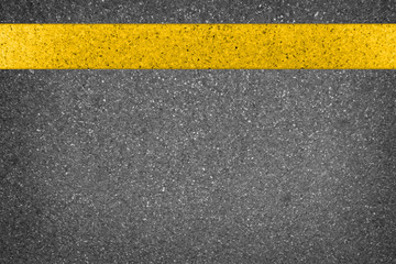 Fototapeta premium Yellow line on road texture