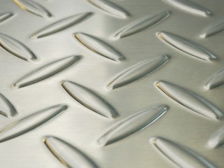 Close up image of Texture of metal steel diamond plate for Background.A