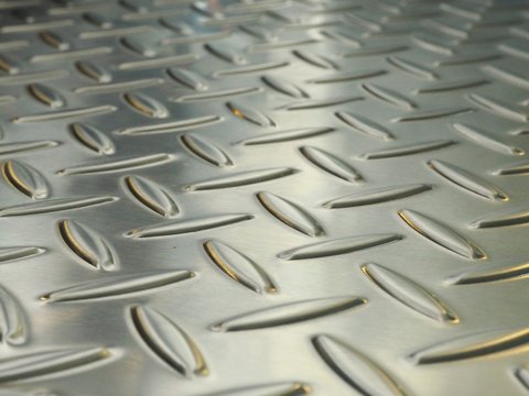 Close up image of Texture of metal steel diamond plate for Background.A